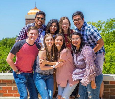 A group of students poses for a photo.